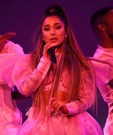 Just days after nude photos of her were reportedly leaked online, Ariana Grande shared a racy selfie on Instagram. The hitmaker can be seen winking at the camera while laying down and dressed in a ...